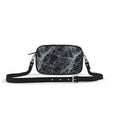 SKÆR STUDIO architectural designer purse with a sleek black marble pattern and adjustable strap