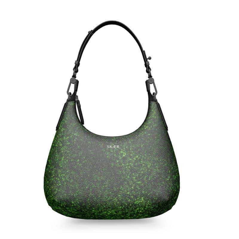 Moss green designer handbag by SKÆR STUDIO with a sleek mini curve design and adjustable strap