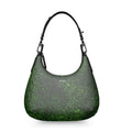 Moss green designer handbag by SKÆR STUDIO with a sleek mini curve design and adjustable strap