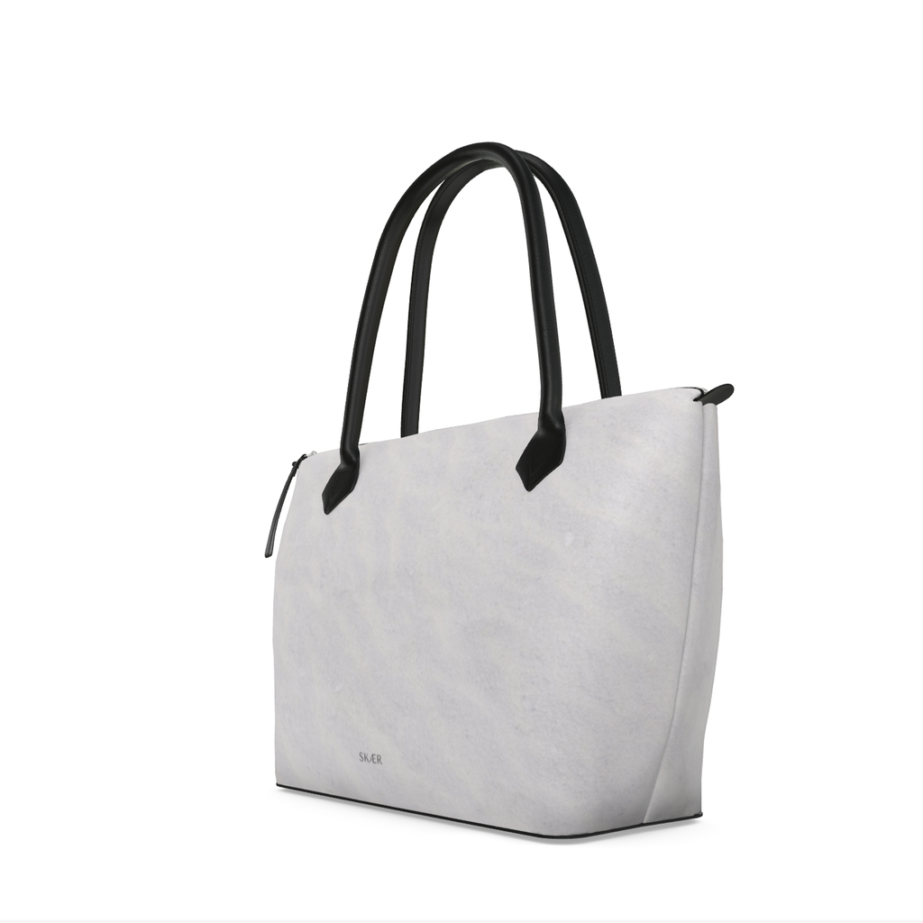 SKÆR STUDIO Arctic inspired designer tote bag with a sleek gray finish and black handles