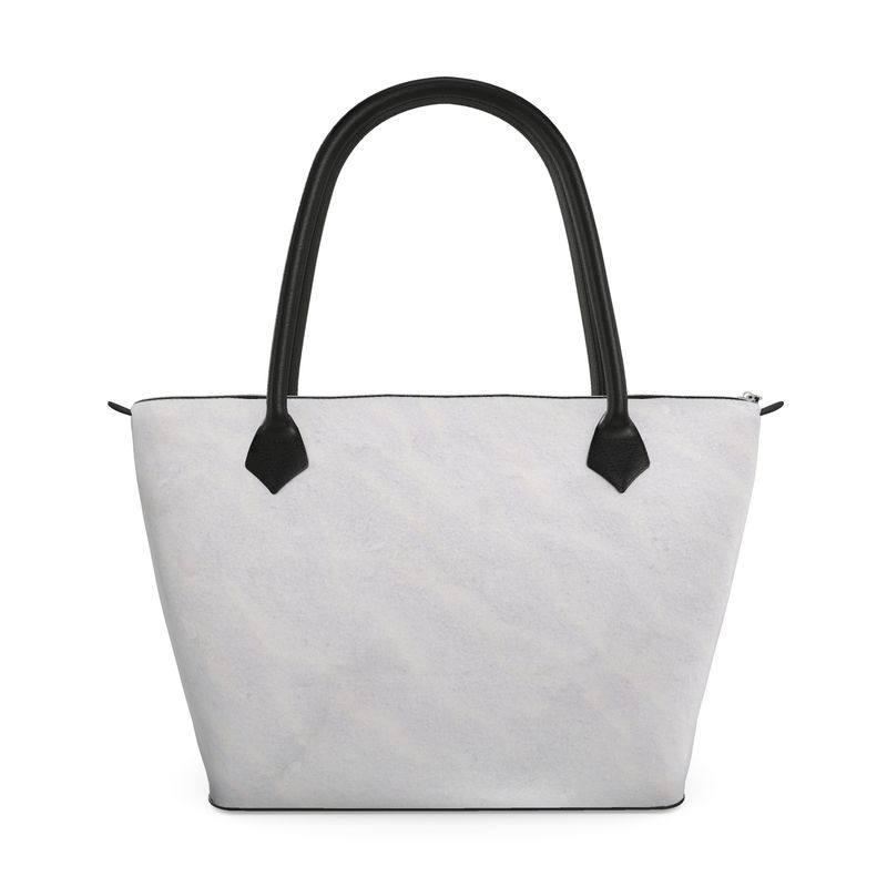 Arctic inspired designer tote bag with sleek black handles and a minimalist white design