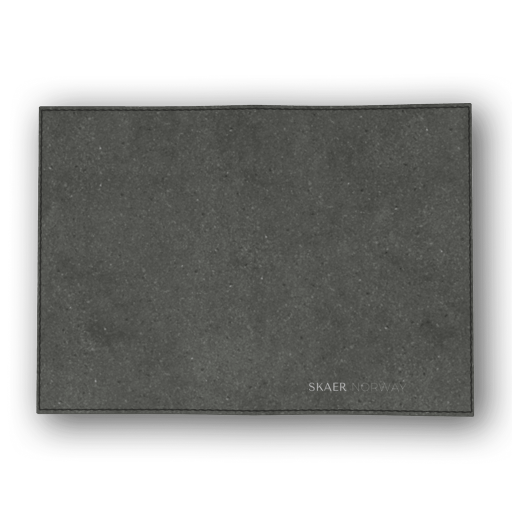 Modern black leather desk passport cover by SKÆR STUDIO with a sleek and minimalist design